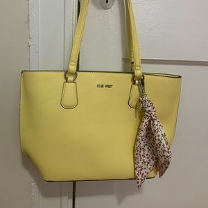 Soft yellow Nine West shoulder bag w/ floral tie